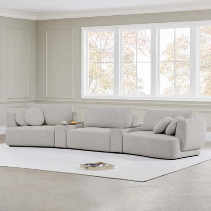 Grace 3-Seat Modular Curved Sofa with round cushions in a bright modern living room - CHITA Living