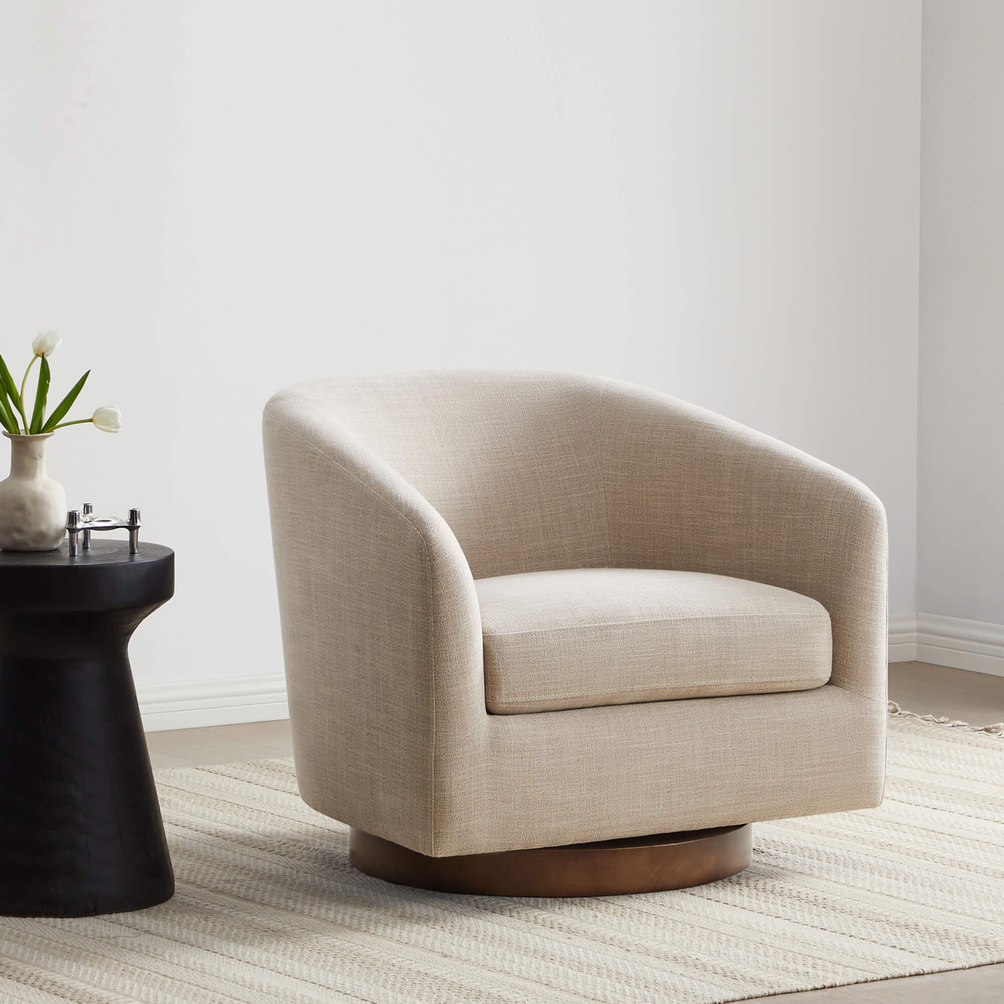 Beige Wren Modern Swivel Accent Chair with wood base in minimalist living room setting - CHITA Living