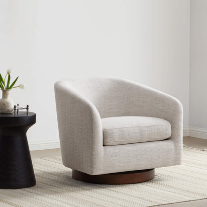 Beige swivel accent chair on a patterned rug next to a sleek black side table - CHITA Living