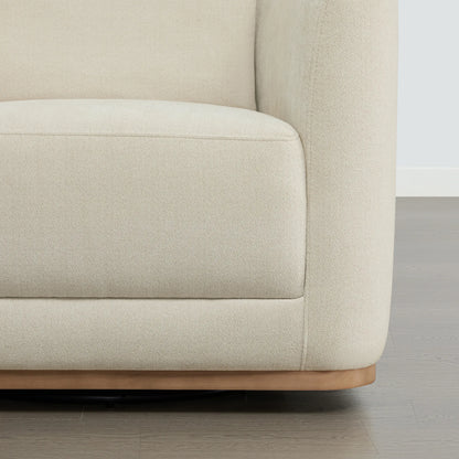 Corinne Curved Leather Swivel Accent Chair