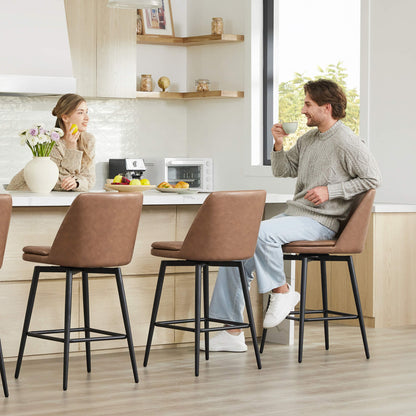 Couple at kitchen counter with Eli swivel bar stools featuring brown faux leather seats - CHITA Living