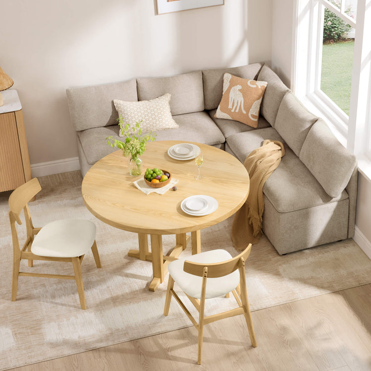 Lila 5-seat dining banquette with storage in beige, round wood table, and two chairs