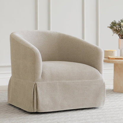 EllaGrace slipcovered swivel armchair in soft beige, perfect for modern interiors - CHITA Living