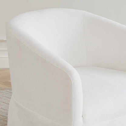 Close-up of white EllaGrace swivel armchair showcasing soft fabric and rounded design - CHITA Living