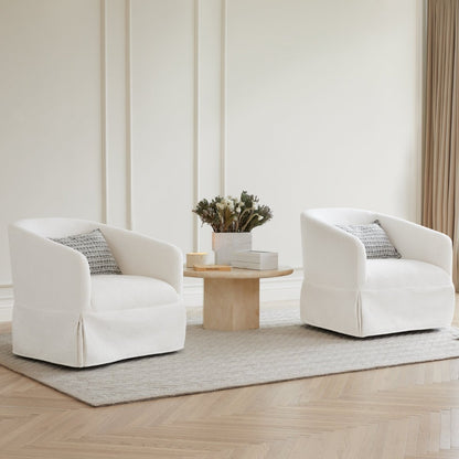 Pair of stylish white EllaGrace swivel armchairs with decorative table in modern living space - CHITA Living