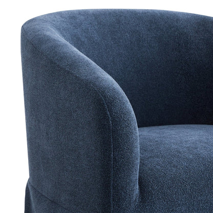 Close-up of navy blue EllaGrace swivel armchair featuring plush fabric and curved design - CHITA Living