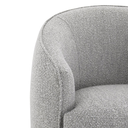 Light grey swivel accent chair close-up, showcasing soft texture and rounded shape - CHITA Living