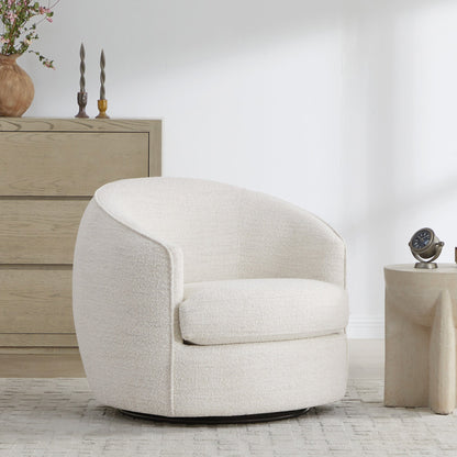 Cozy white swivel accent chair with rounded design in bright modern living room - CHITA Living