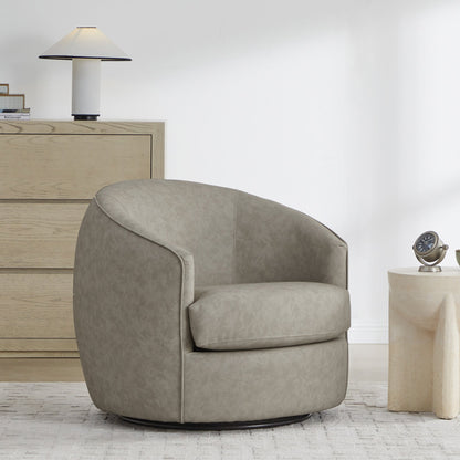 Light grey swivel accent chair with rounded design in bright modern living space - CHITA Living