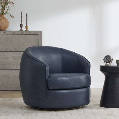 Dark blue swivel accent chair in cozy modern living room beside a stylish side table - CHITA Living