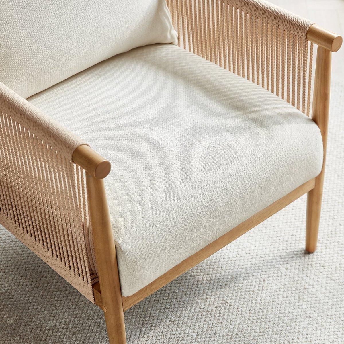 Close-up of Sienna Modern Braid Chair with cream cushion and braided backrest - CHITA Living