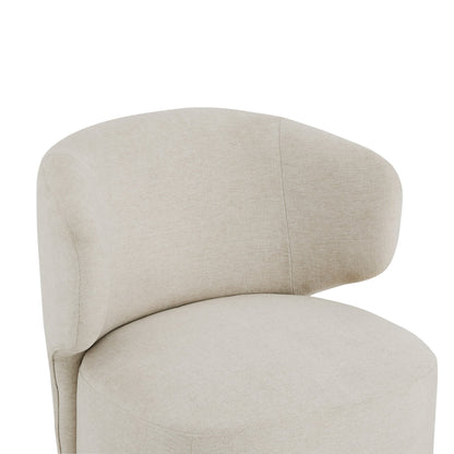 Close-up of Skylar modern swivel accent chair showcasing soft beige fabric and curved design - CHITA Living