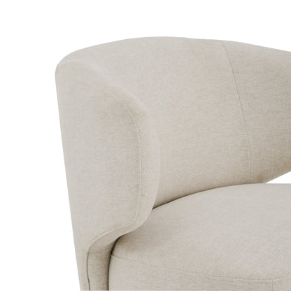 Close-up of Skylar swivel accent chair showcasing soft beige upholstery and curves - CHITA Living