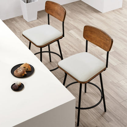 Aislinn swivel bar stools with wood backs and soft seats near a kitchen island - CHITA Living