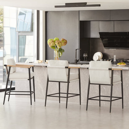 Charlotte Modern Counter Stools with light gray fabric and black metal frame in a minimalist kitchen - CHITA Living