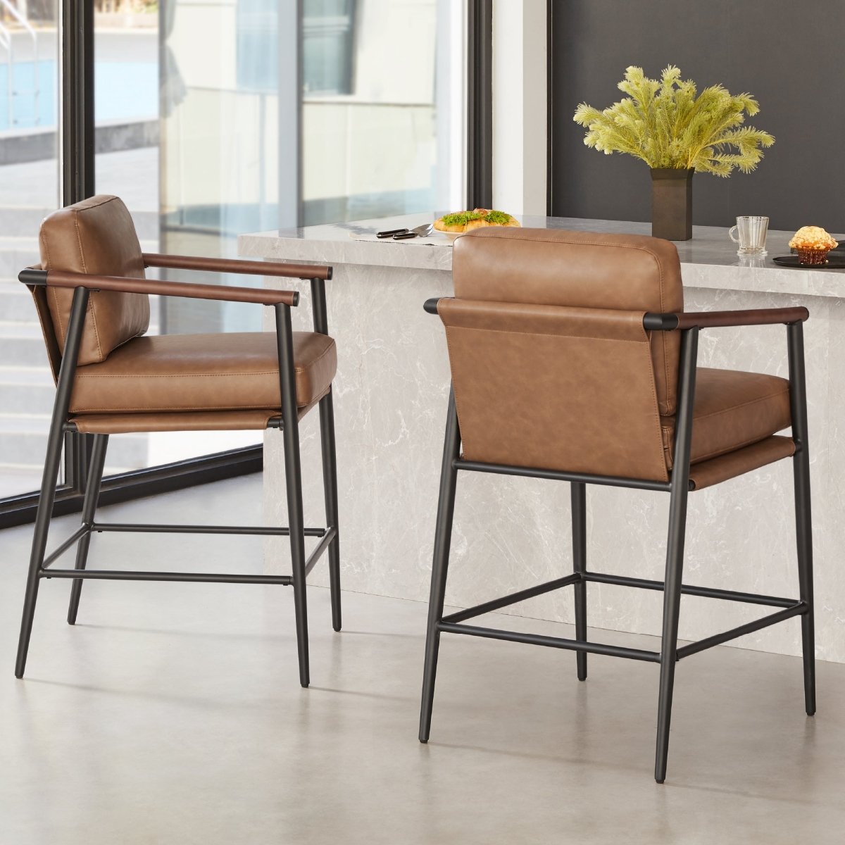 Charlotte Modern Counter Stool with brown leather seat and metal frame in a stylish kitchen - CHITA Living