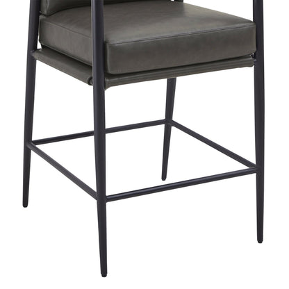 Charlotte Modern Counter Stool close-up featuring dark green leather seat and sleek metal frame - CHITA Living