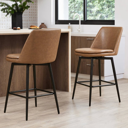 Eli swivel bar stools with brown faux leather seats and black metal frames in a kitchen - CHITA Living