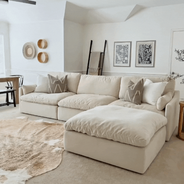 Kenna Modular Sectional Sofa-Chaise in cream color, with soft cushions, perfect for a cozy living room.